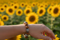 Brown Wood Bead & Silver Sunflower Charm Slip-On Bracelet