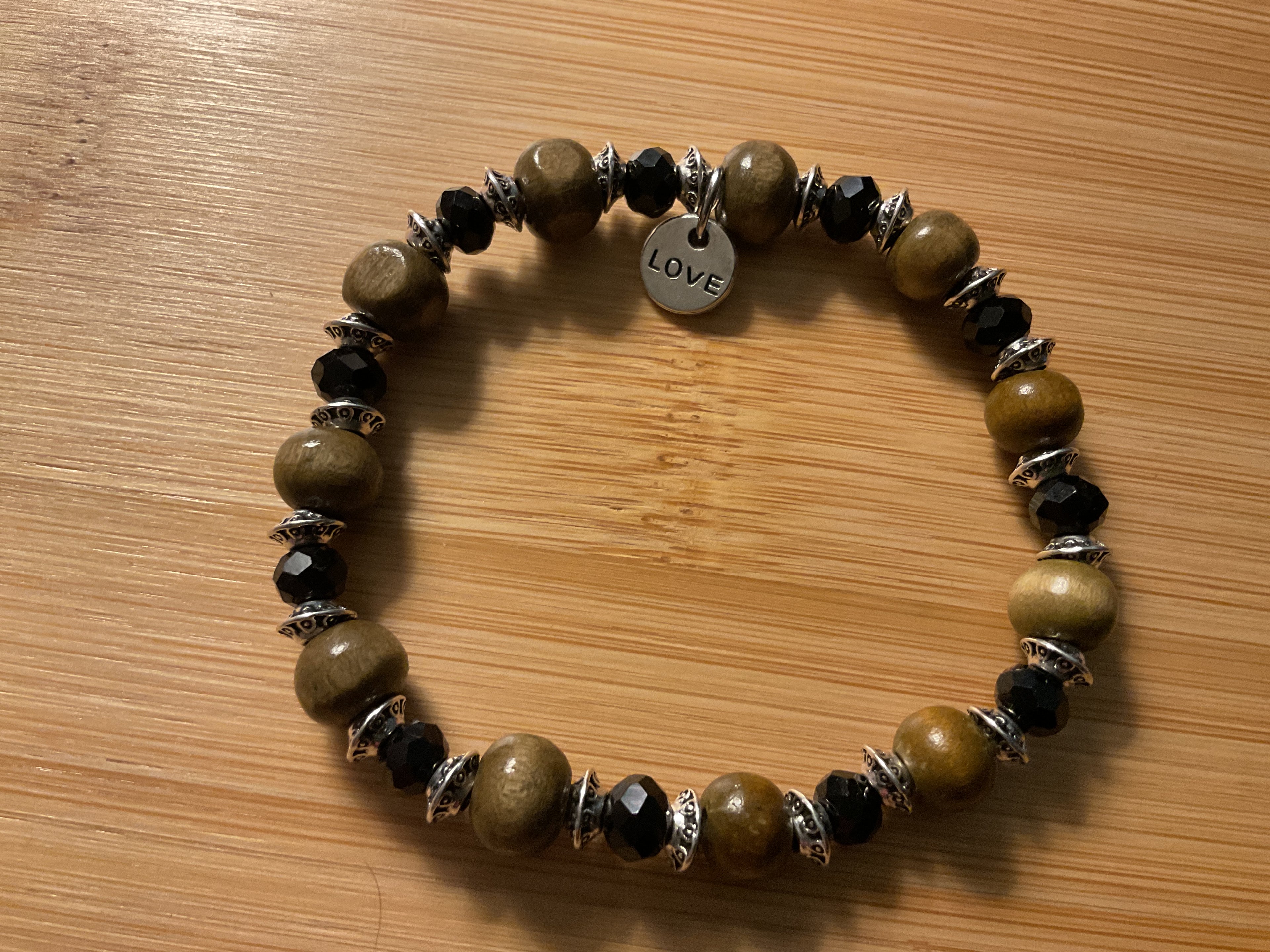 Pea Green Wooden Bracelet with Black Crystal & Silver Spacers